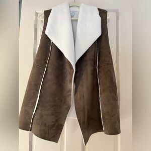 A faux suede and sherpa lined vest.